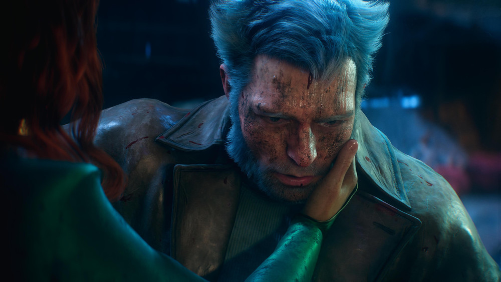 Wolverine sumido en un tormento interior, con la mirada perdida y baja; Jean le pone la mano en la mejilla