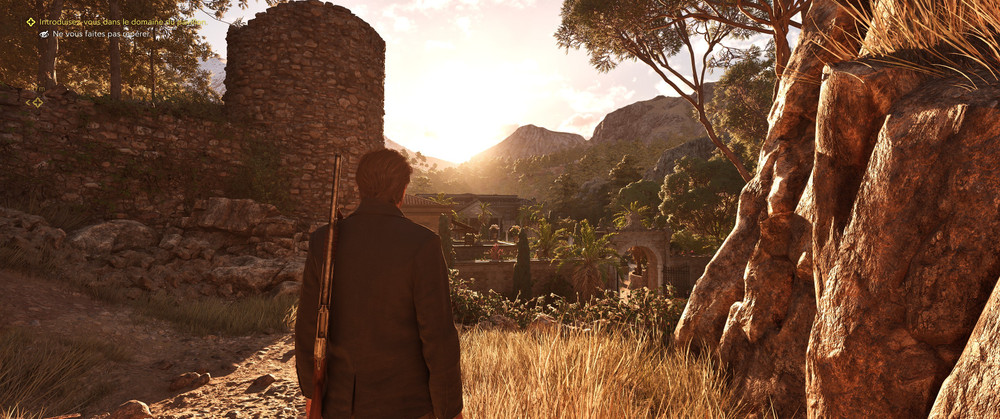 A luminous sunset landscape with Enzo in the center, carrying a rifle on his back