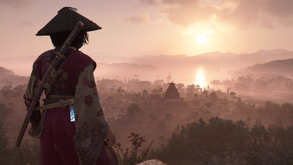 Naoe qui pose devant une longue vallée du Japon