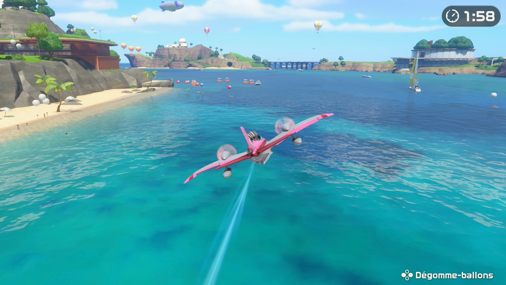 Extrait de gameplay avec l’hydravion au-dessus d’une plage