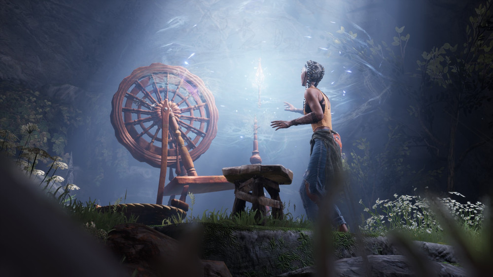 Still from a cutscene showing Hazel in front of a spinning wheel